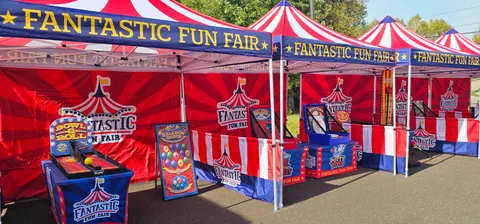 Fantastic Fun Fair carnival tents with the Fantastic Fun Fair name on every canopy